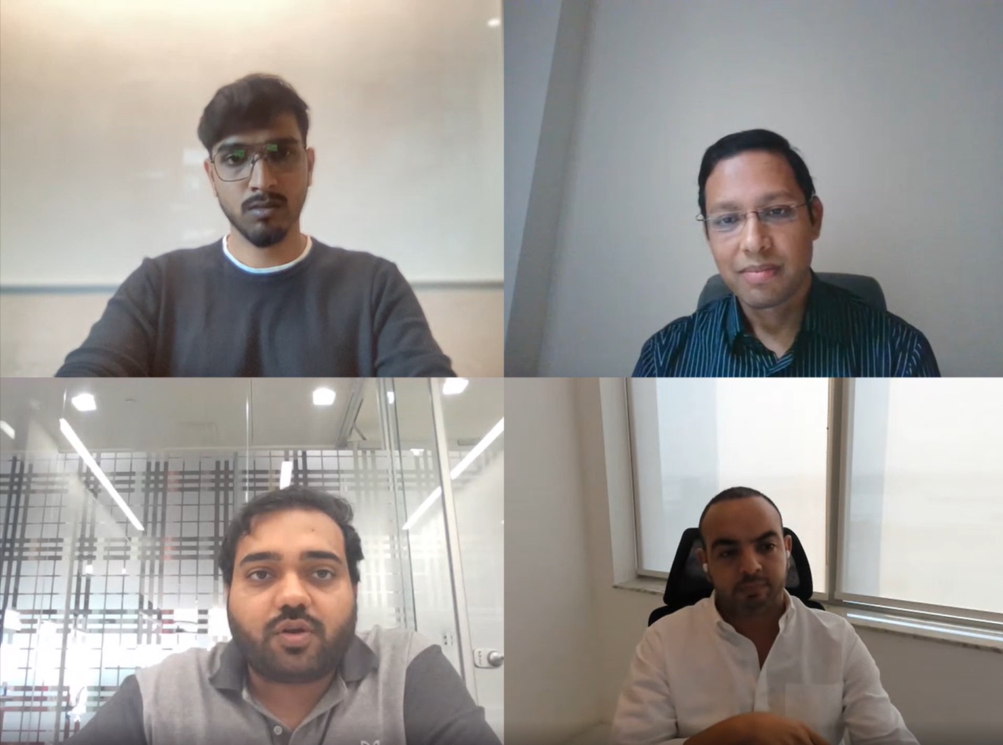 The fireside chat panel meeting over a four-way video call, with the moderator and three panelists on screen.