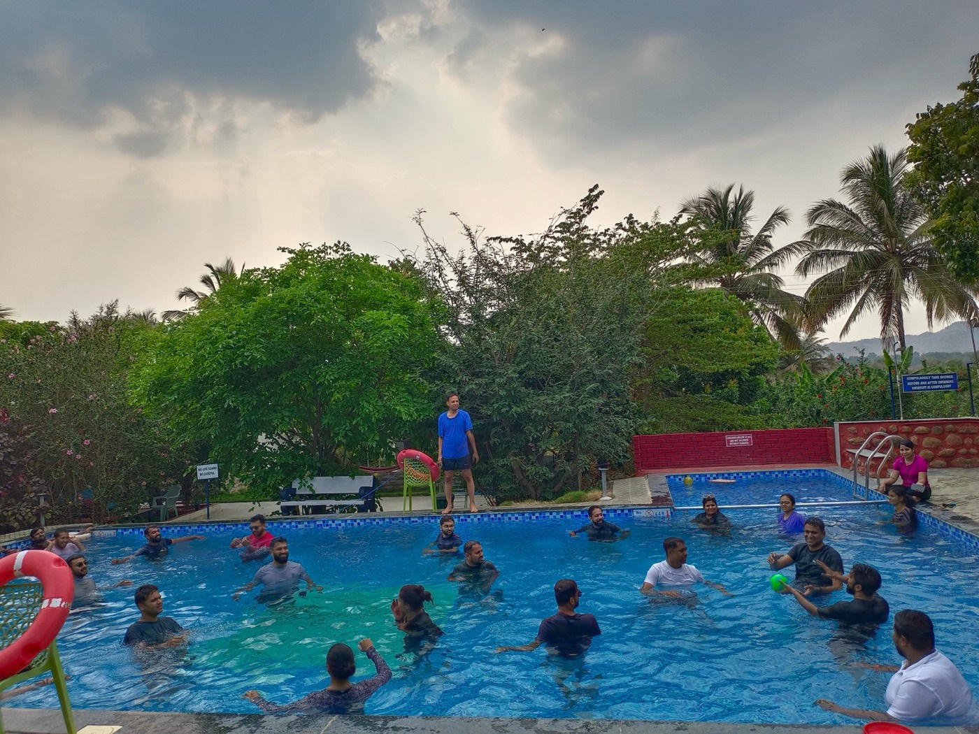 The team in the pool on an afternoon at the offsite